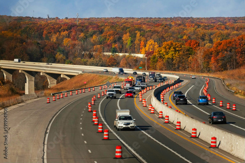 The Ohio Turnpike curves through a construction area in the Cuyahoga Valley of Northeast Ohio amid autumn colors