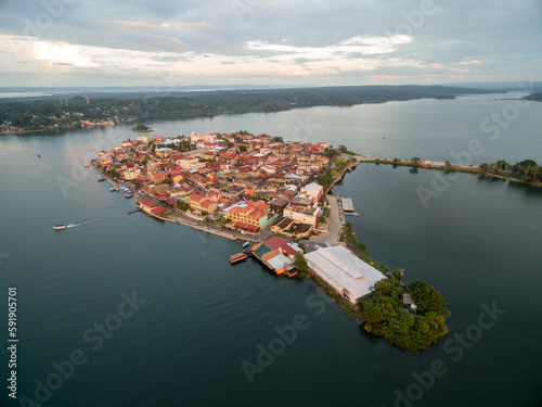 Flores island in Guatemala. Sunset Light with Lake Peten Itza in background