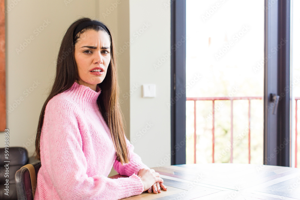 pretty caucasian woman feeling terrified and shocked, with mouth wide open in surprise pretty caucasian woman feeling terrified and shocked, with mouth wide open in surprise