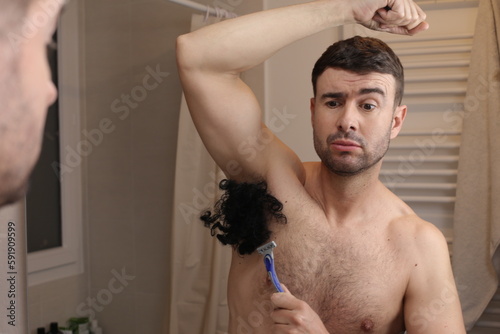 Man with an extremely hairy armpit 