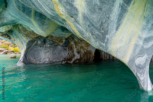 Marble Caves (Marble Cathedral), Puerto Rio Tranquilo, Aysen, Chile. The Marble Caves is a 6,000-year-old sculpture hewn by the crashing waves of Lake General Carrera of Patagonia. 