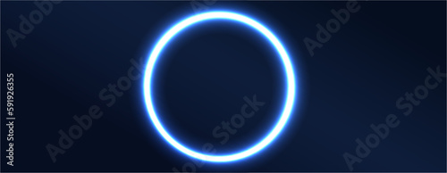 Glowing neon light round frame. Abstract circle flowing in blue light on a dark gradient background with place for text