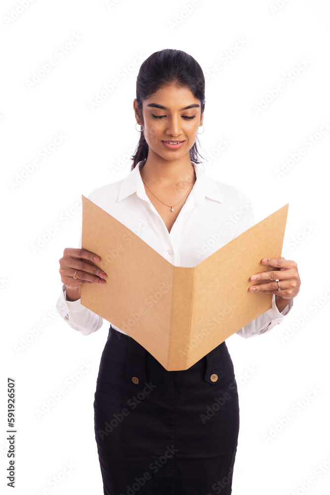 Young Indian business woman with file isolated on white. Young Indian business woman with file isolated on white.