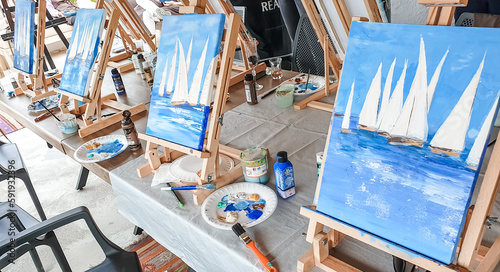 Turkey Marmaris 01.04.2023 Painting masterclass. Art party in restaurant. Glass of wine. Aquarelle watercolor, acrylic paints. Beginners class. Seascape nautical marine theme, sea boats, ships sails