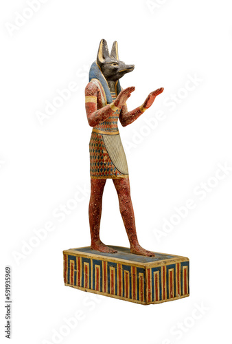 Ancient Egyptian statuette of god Anubis isolated photo