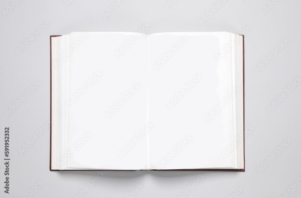 Open blank book with white pages on a gray background. Template for design, mock up Open blank book with white pages on a gray background. Template for design, mock up