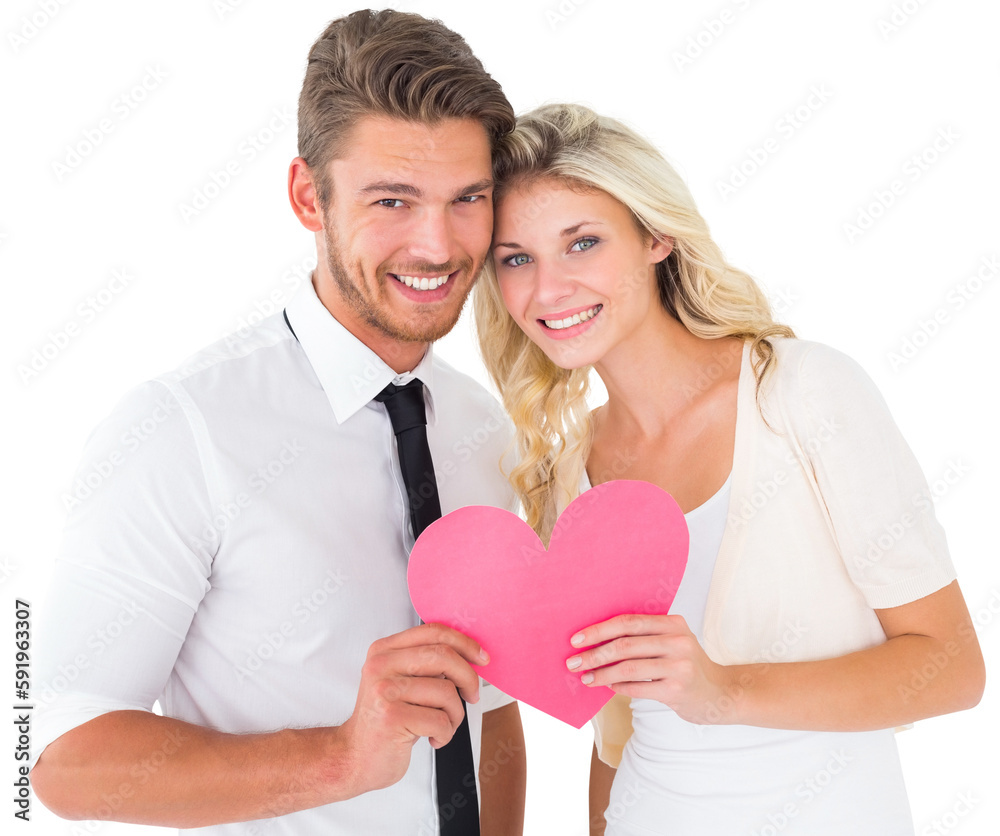 Attractive young couple holding pink heart
