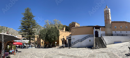 Morocco, Africa: view of Outa el Hamam, the central square of Chefchaouen dominated by the 15th century kasbah and the town Grand Mosque