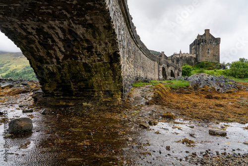 A view of Eilean Donan Castle and its causeway bridge in Kyle of Lochalsh, Scotland; Kyle of Lochalsh, Scotland photo