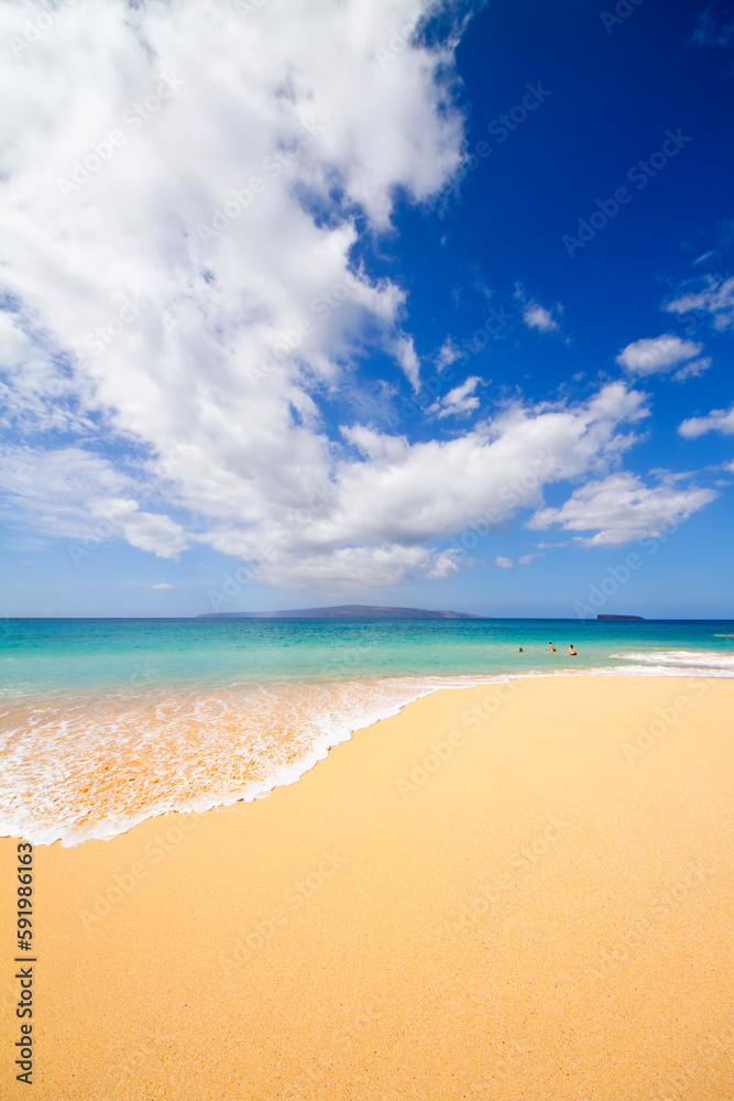 People swimming in ocean at Big Beach or Oneloa Beach, at Makena on the Island of Maui, Hawaii, USA People swimming in ocean at Big Beach or Oneloa Beach, at Makena on the Island of Maui, Hawaii, USA