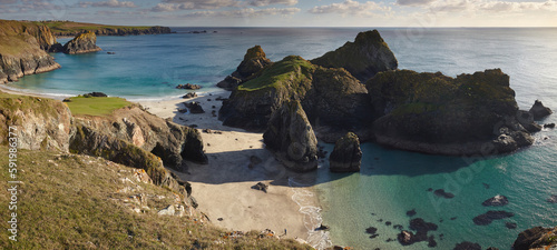 Overlook of rock formations and Atlantic Ocean at Kynance Cove near the Lizard; Kynance Cove, Cornwall, England, Great Britain