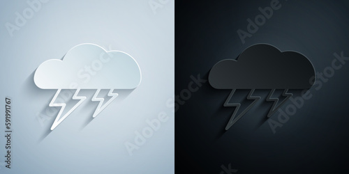 Paper cut Storm icon isolated on grey and black background. Cloud and lightning sign. Weather icon of storm. Paper art style. Vector