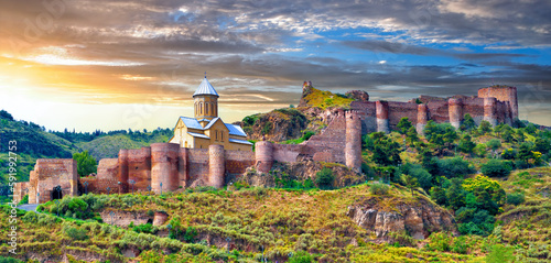 Fototapete Picturesque sunrise over the ancient Narikala fortress in the city of Tbilisi