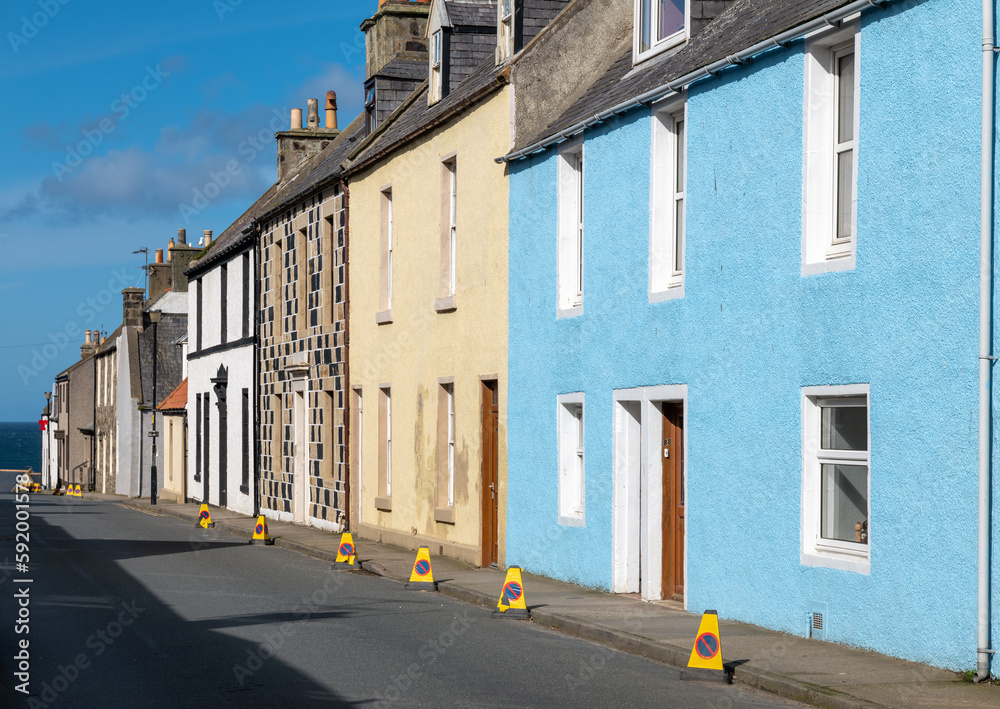 12 April 2023. North Castle Street,Banff,Aberdeenshire,Scotland. This is the view along the street towards the sea with a large amount of No Waiting Cones to stop people parking.