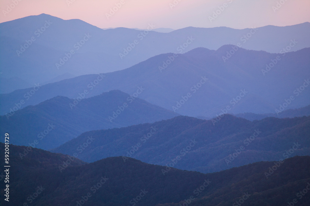 Silhouetted mountains at twilight in Great Smoky Mountains National Park, at the North Carolina-Tennessee border; North Carolina/Tennessee, United States of America Silhouetted mountains at twilight in Great Smoky Mountains National Park, at the North Carolina-Tennessee border; North Carolina/Tennessee, United States of America