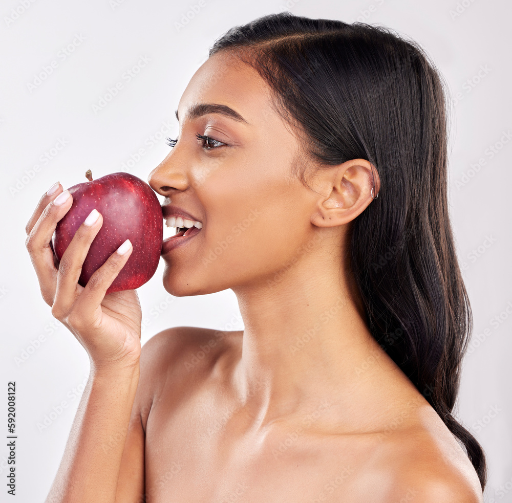 Woman, apple with face profile and health with nutrition and fruit, healthy food and diet on studio background. Weight loss, organic and fresh produce with happy female eating, wellness and lifestyle Woman, apple with face profile and health with nutrition and fruit, healthy food and diet on studio background. Weight loss, organic and fresh produce with happy female eating, wellness and lifestyle