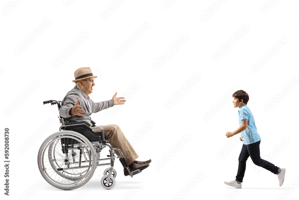 Child running towards an elderly man in a wheelchair Child running towards an elderly man in a wheelchair