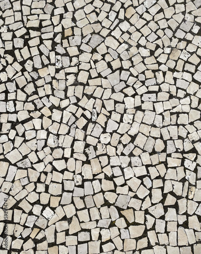 White paving stones on the roads of Portugal, top view