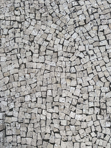 White paving stones on the roads of Portugal, top view
