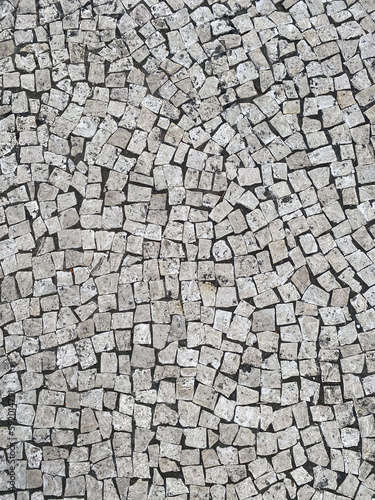 White paving stones on the roads of Portugal, top view