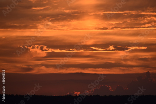 Red blue pink evening sky in summer. Beautiful sunset in the evening. Gradient sky.