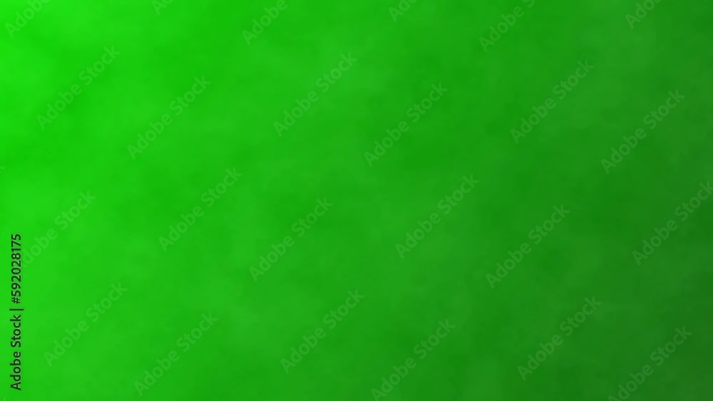 Dark smoke on a green screen, loop chroma key background