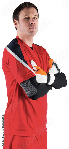 Goalkeeper in red looking at camera