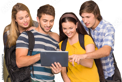 Students using digital tablet at college corridor