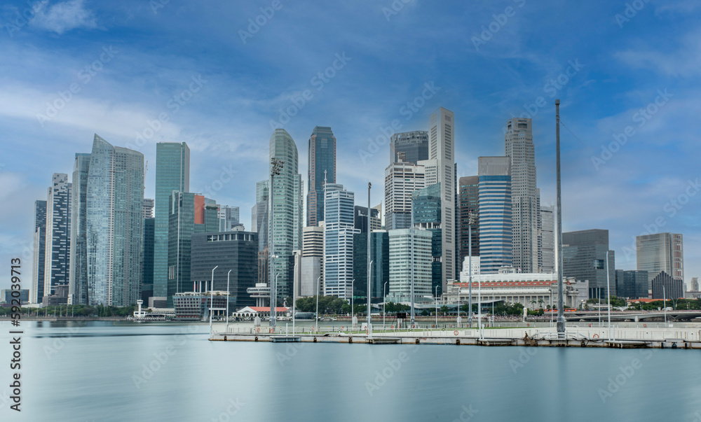 Singapore downtown Financial district skyline with moving clouds