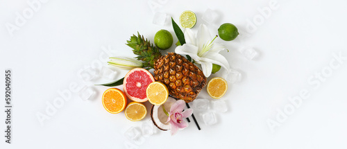 Fototapeta Naklejka Na Ścianę i Meble -  Summer composition with tropical fruits, flowers and ice cubes on white background