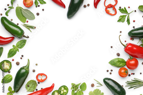 Frame made of different spices  herbs and jalapeno peppers on white background