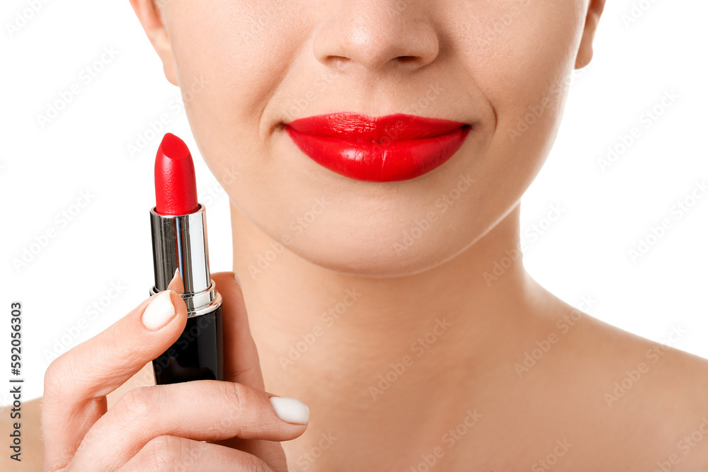 Woman with red lipstick on white background, closeup