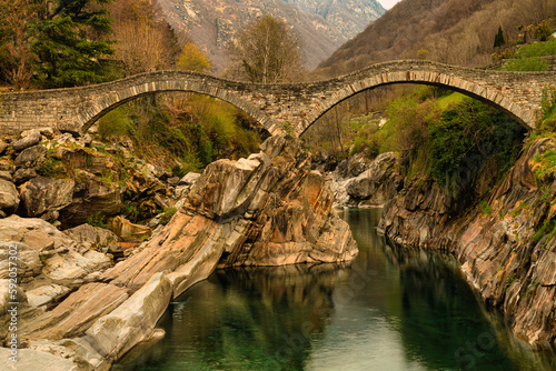 Hiking Trail at the famous Bridge called Ponte dei Salti in Lavertezzo, Verzasca Valley, Ticino Canton, Switzerland