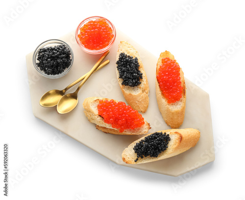 Tasty bruschettas with red and black caviar on white background