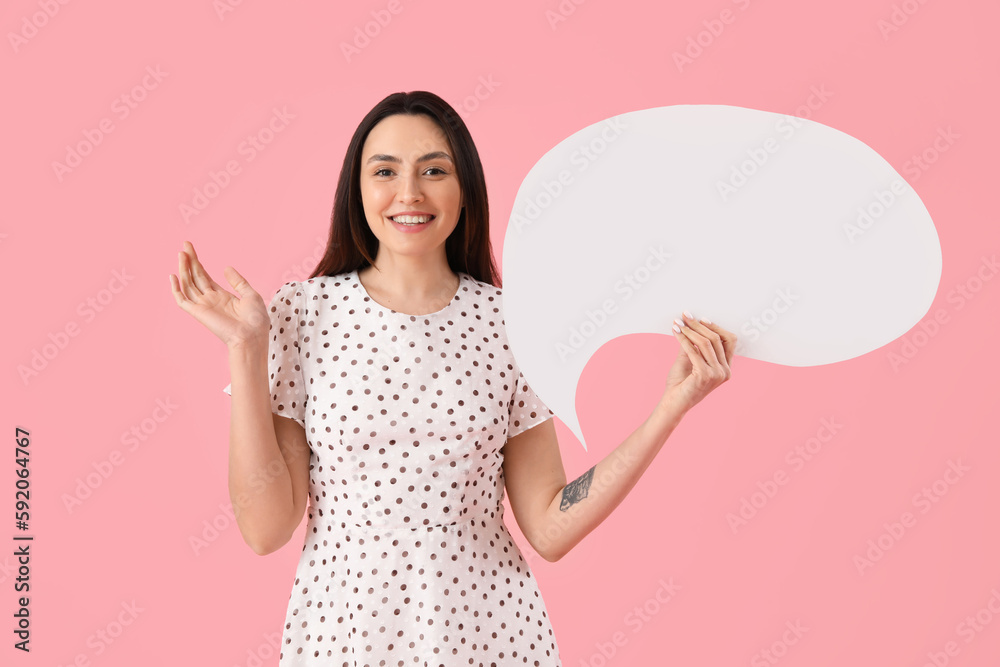 Young woman with blank speech bubble on pink background Young woman with blank speech bubble on pink background