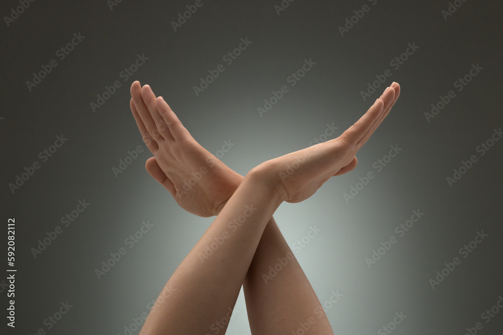 A gesture of prohibition or termination A gesture of prohibition or termination