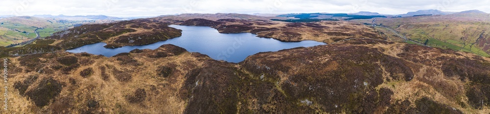 Panorama of a lake at Snowdonia national park in Wales, UK. High quality photo