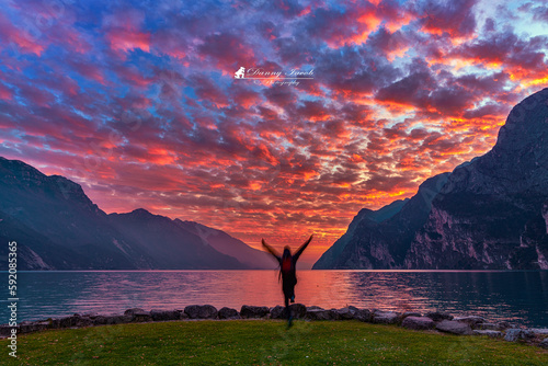 View of the beautiful Lake Garda surrounded by mountains, Scenic view of sunset at Lake Garda in the evening with the beautiful sunset colors, italy, Soft focus due to long exposure