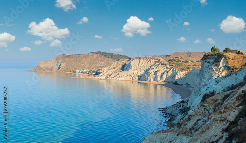 Sandy beach under famed white cliff, called "Scala dei Turchi", in Sicily, near Agrigento, Italy
