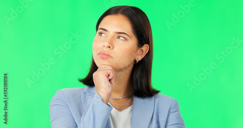 Business, woman and thinking on green screen of ideas, questions and remember in studio. Female model, serious worker and think of solution, decision and memory of why, choice and visionary mindset