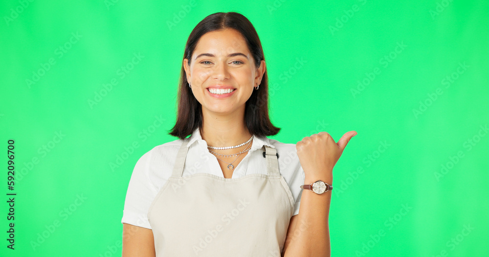 Woman, happy and portrait on green screen while pointing finger at mockup space with apron. Professional female with a smile for advertising business choice or promotion on a studio background Woman, happy and portrait on green screen while pointing finger at mockup space with apron. Professional female with a smile for advertising business choice or promotion on a studio background