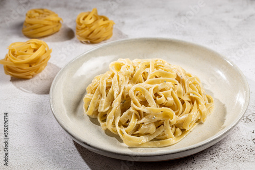 Delicious fettuccine pasta with white cheese sauce. Fettuccine pasta with Alfredo sauce.