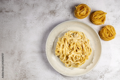 Delicious fettuccine pasta with white cheese sauce. Fettuccine pasta with Alfredo sauce.