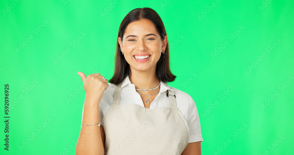 Happy, woman and portrait on green screen while pointing finger at mockup space with apron. Female model with a smile for advertising business or employee choice or special on a studio background Happy, woman and portrait on green screen while pointing finger at mockup space with apron. Female model with a smile for advertising business or employee choice or special on a studio background
