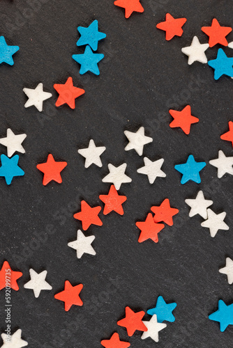 small star shaped confectionery decorations, close up