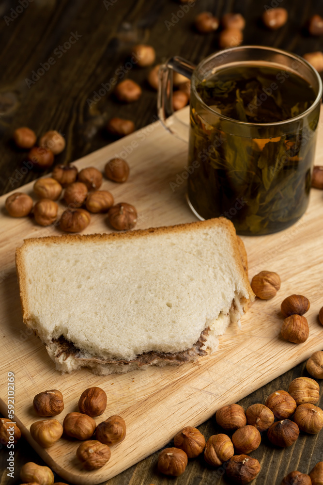 slices of bread with chocolate butter on the table slices of bread with chocolate butter on the table
