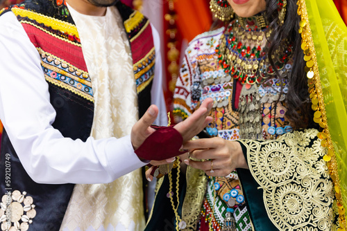 Afghani pre wedding henna heena night ceremony rituals hands close up photo