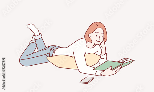 Young female lying on a floor and reading a book. Hand drawn style vector design illustrations.
