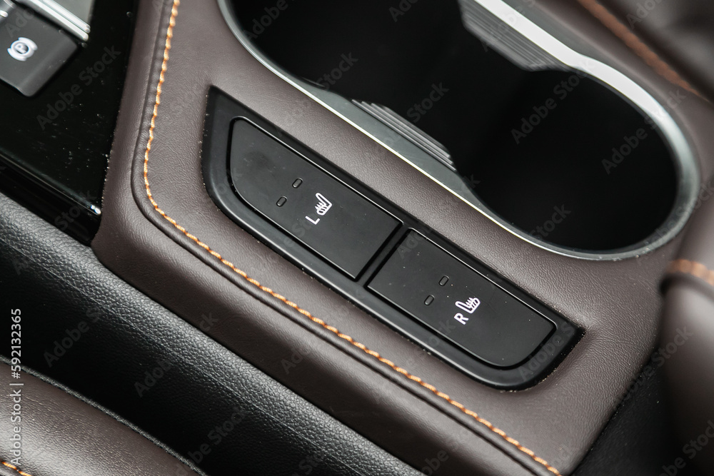 Close up shot of car seat heating control panel