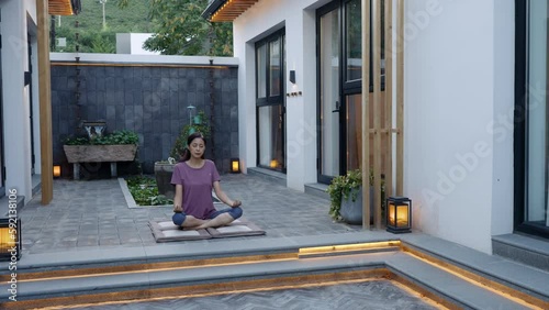 Mature woman doing yoga outdoors,4K